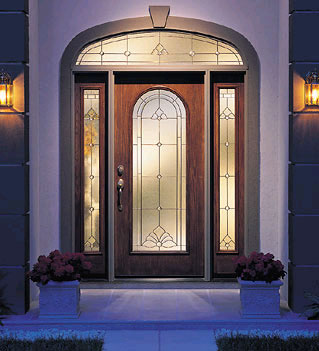 Wood entry door system with decorative glass and sidelights